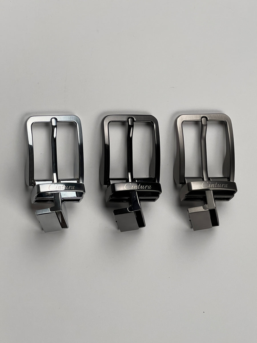 Interchangeable buckle attaching to belt strap